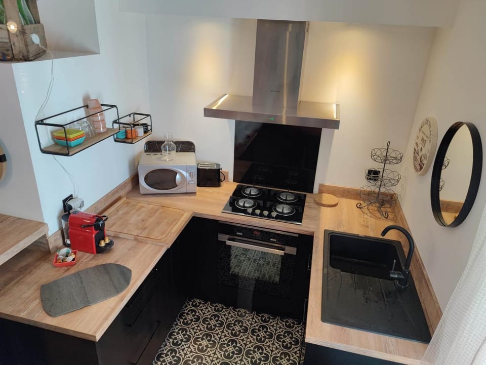 Kitchen or kitchenette, stove, toaster