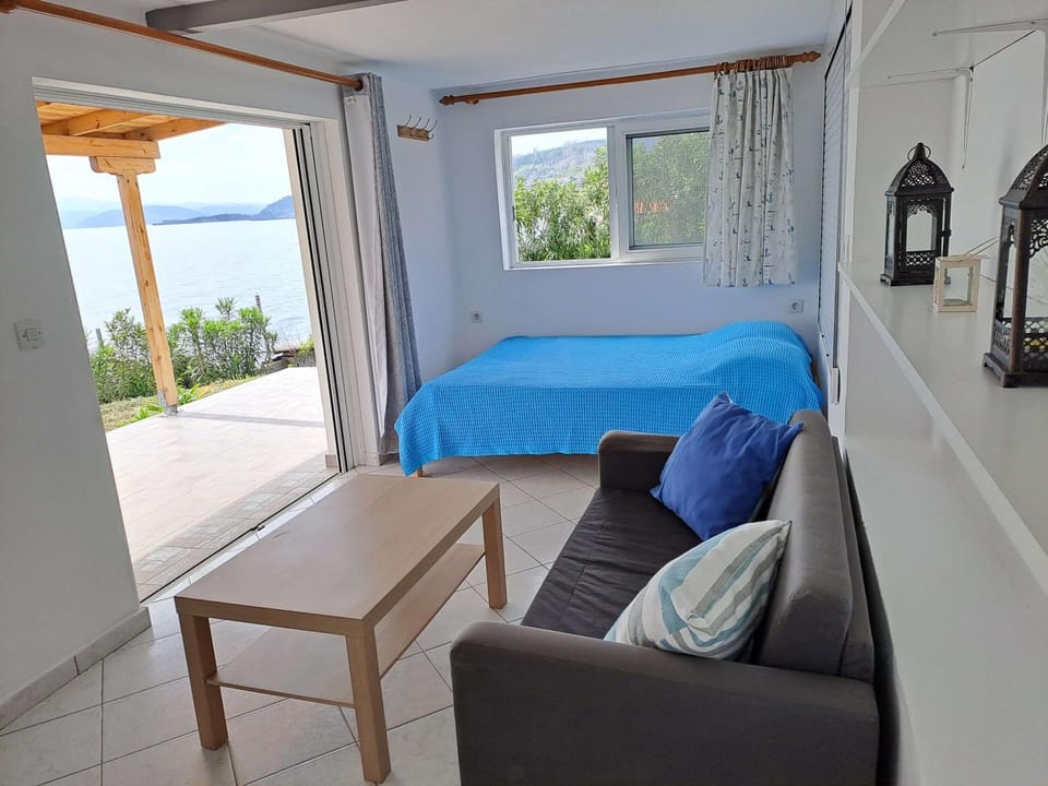Bed, View (from property/room), Living room, Seating area, Bedroom