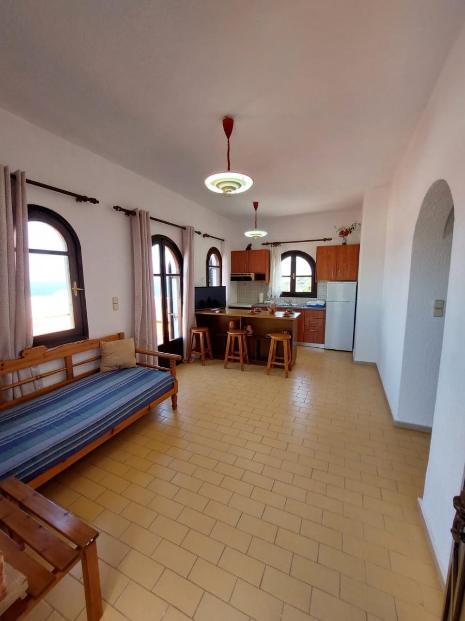 Kitchen or kitchenette, Living room, Seating area, Dining area