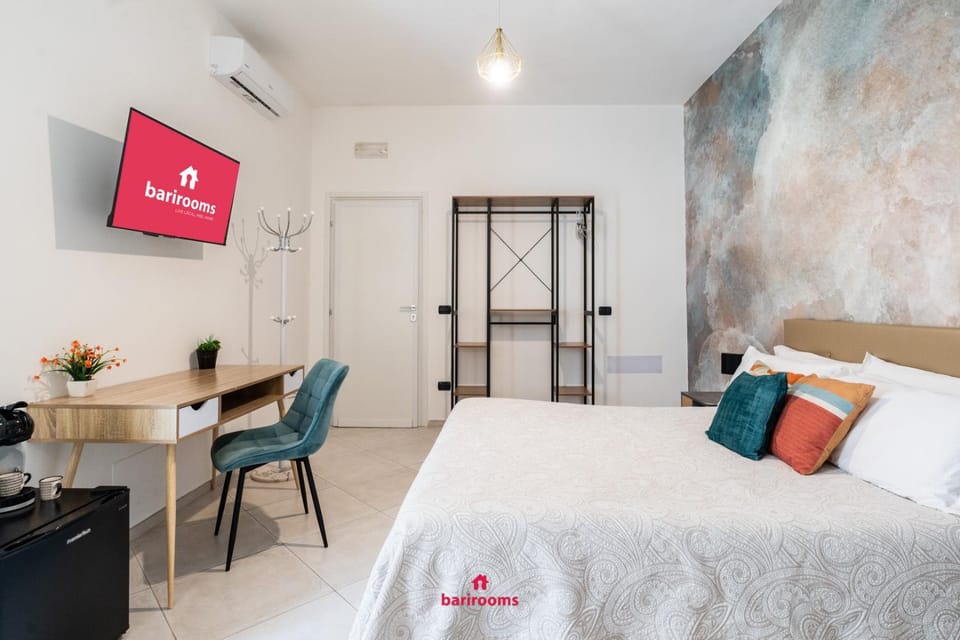 Bed, TV and multimedia, Seating area, Bedroom, air conditioner