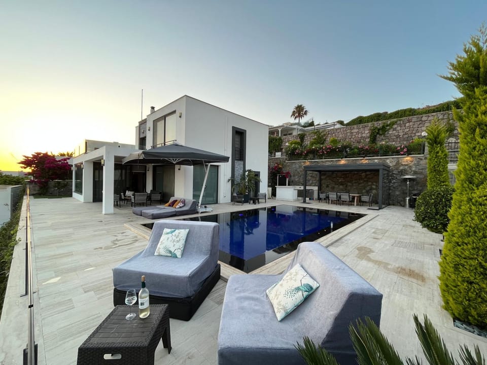 Property building, Day, Seating area, Pool view, Swimming pool, sunbed
