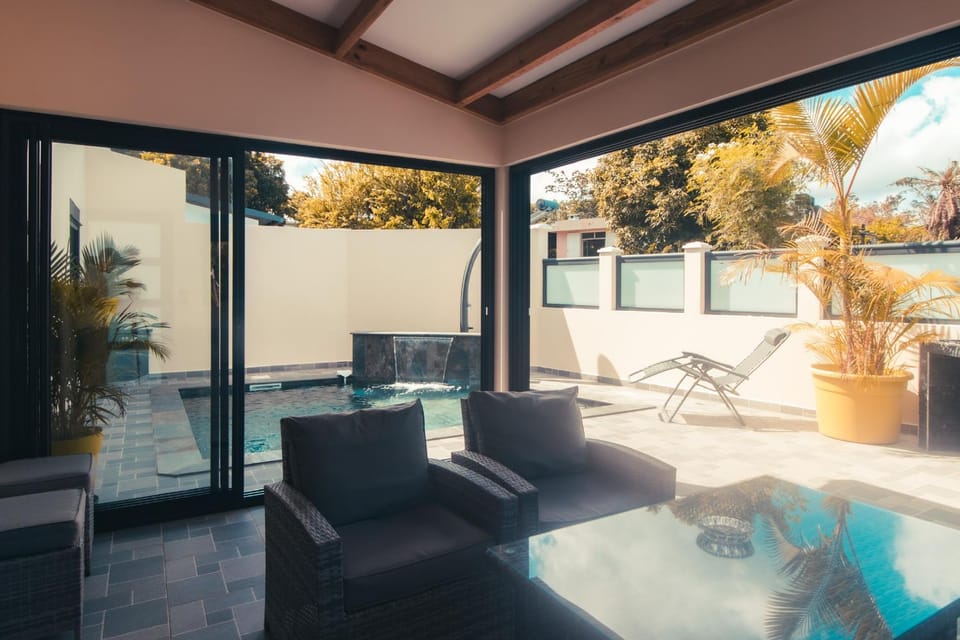 Patio, View (from property/room), Balcony/Terrace, Living room, Seating area, Dining area, Pool view, Swimming pool