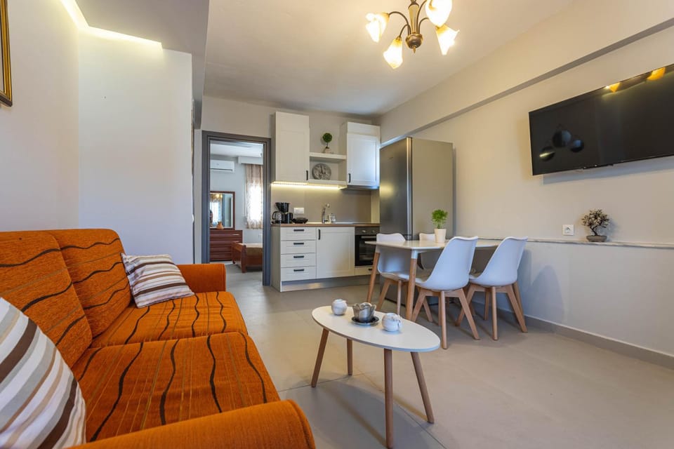 Property building, TV and multimedia, Living room, Seating area, Dining area