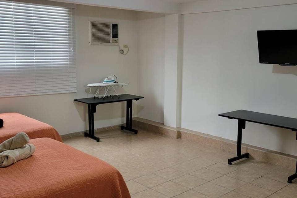 Photo of the whole room, air conditioner