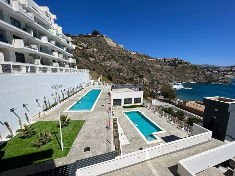 Property building, Living room, Swimming pool