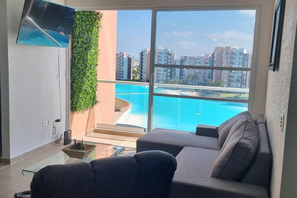 Living room, Seating area, Pool view