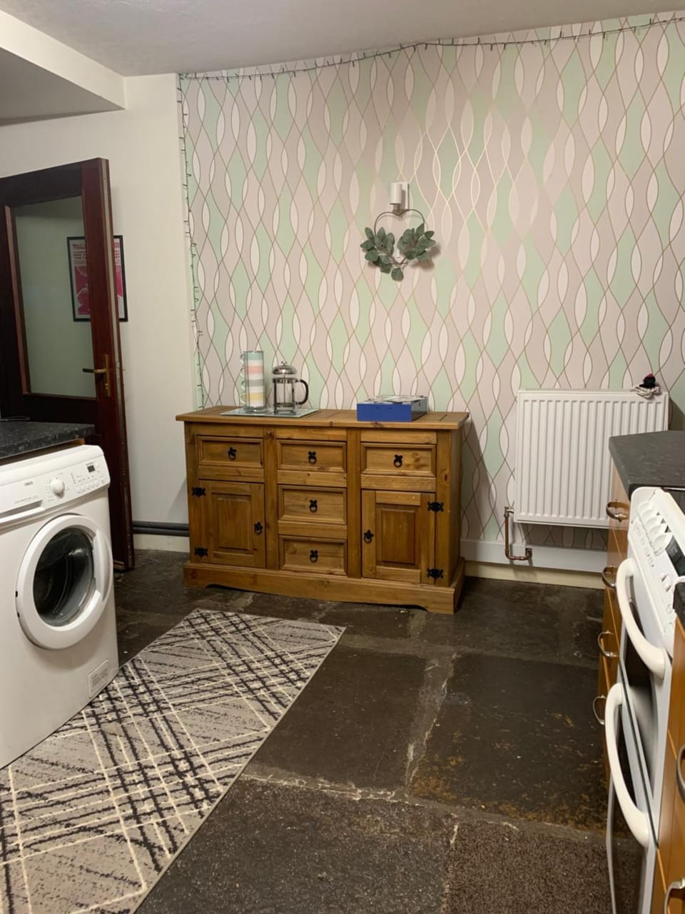 Kitchen or kitchenette, washing machine