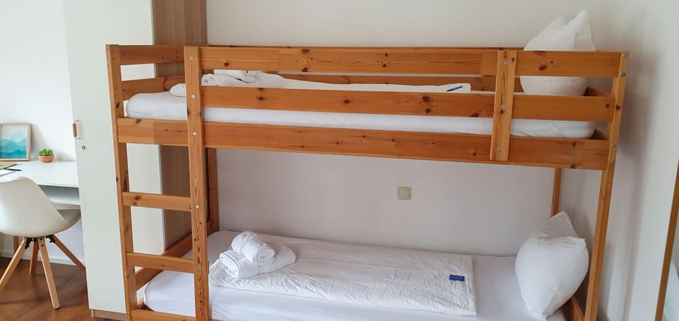 Bed, Photo of the whole room, Bedroom, bunk bed, towels, wardrobe