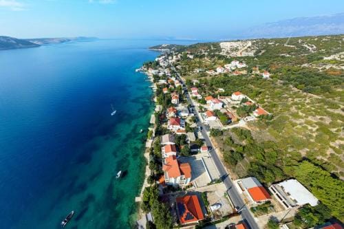 Apartments and rooms by the sea Stara Novalja, Pag - 11626 Hotel in Novalja