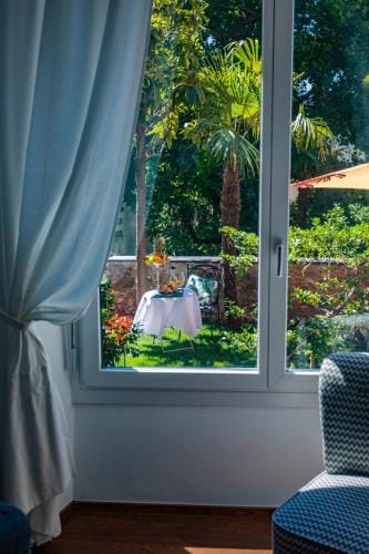VILLA MURALTO Boutique Hotel Rooms and Garden Hotel in Locarno