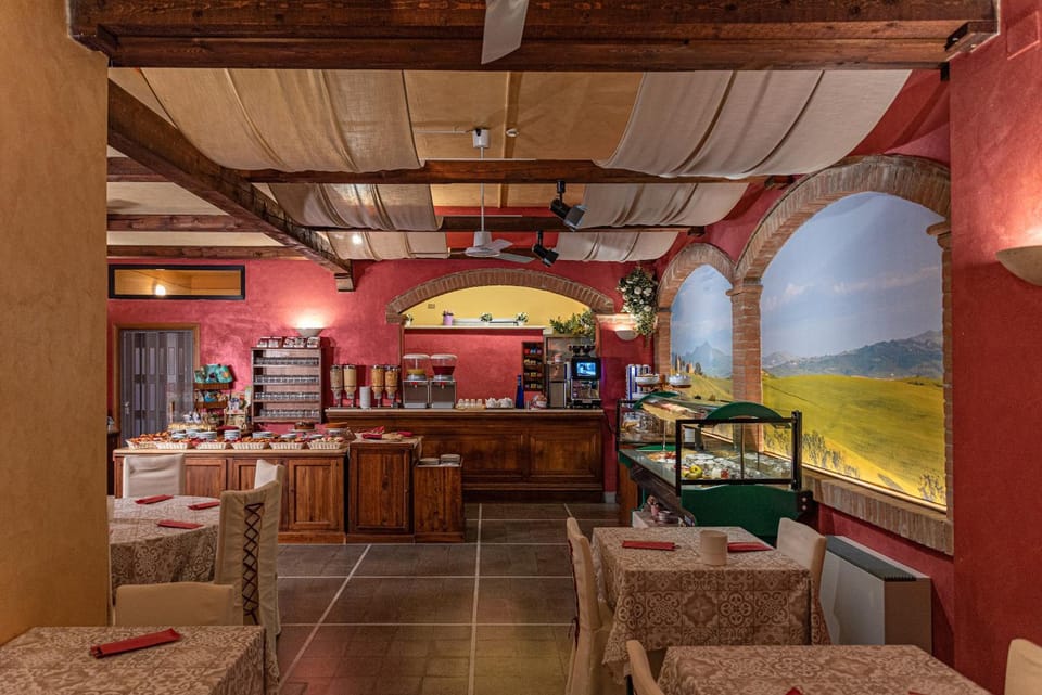 Casanova - Panoramic Rooms and Suites Hotel in San Quirico d'Orcia