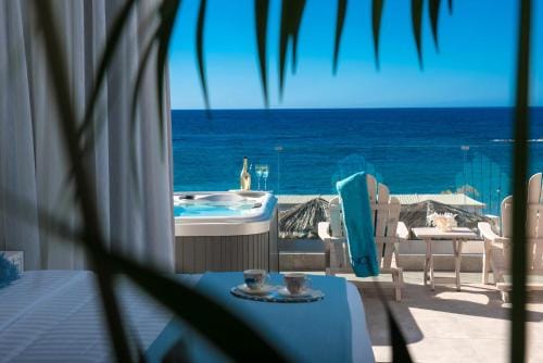 Drossia Palms Hotel and Nisos Beach Suites Hotel in Malia, Crete