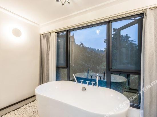 Xihu Qiletang Carbonated Private Hot Spring Homestay Hotel in Hangzhou