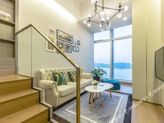 Hangzhou meets the loft hotel apartment with Jiangnan River View Hotel in Hangzhou