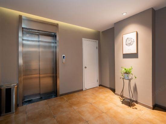Home Pebble Hotel (Wuxi New District Wangzhuang Road Subway Station) Hotel in Suzhou