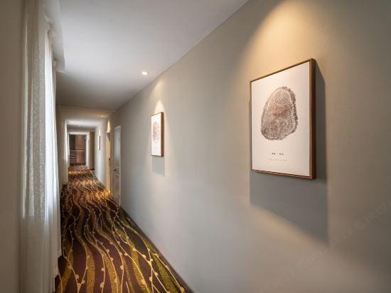 Home Pebble Hotel (Wuxi New District Wangzhuang Road Subway Station) Hotel in Suzhou