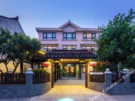 Floral Hotel Wuxi Xingyun Liushui Inn (Lingshan Giant Buddha Nianhuawan Branch) Hotel in Suzhou