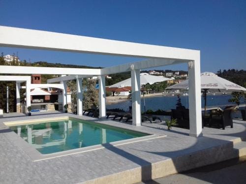 Apartments and rooms with a swimming pool Kampor, Rab - 12773 Hotel in Supetarska Draga