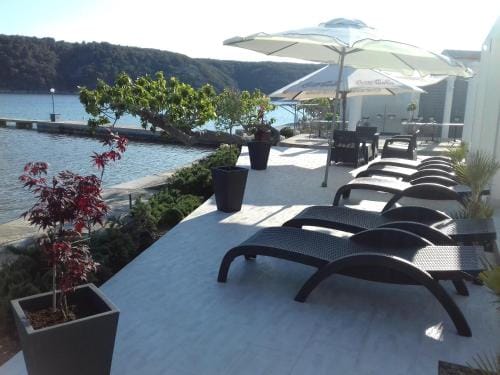Apartments and rooms with a swimming pool Kampor, Rab - 12773 Hotel in Supetarska Draga