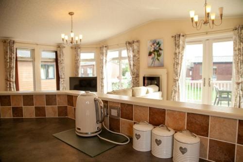 Saffron Lodge With Hot Tub Lodge in England