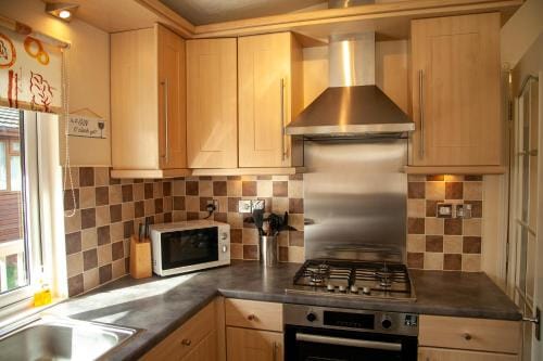 Saffron Lodge With Hot Tub Lodge in England