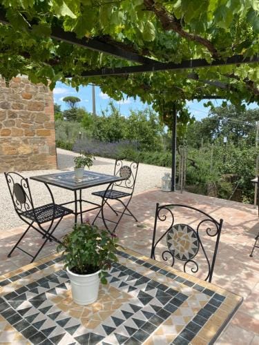 Podere Belsogno-Camera rosmarino Hotel in Montalcino