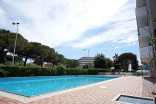 Sea Front Apartment With Swimming Pool And C Tennis Hotel in Porto Santa Margherita
