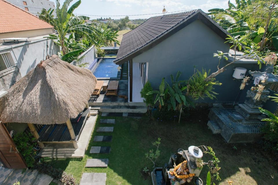 Pluto House Hotel in North Kuta