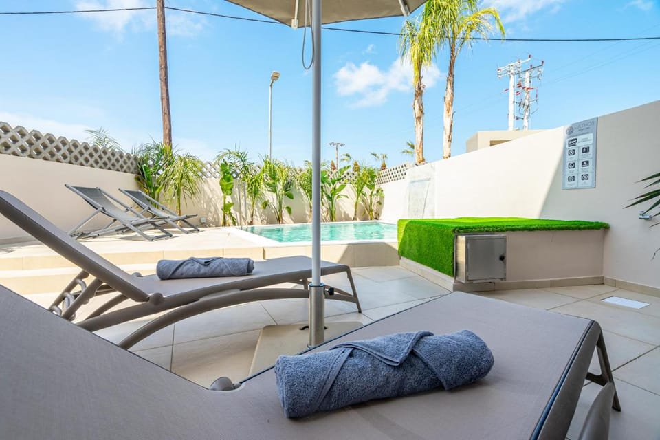 Pathos SeaSide Suites Hotel in Faliraki, Greece
