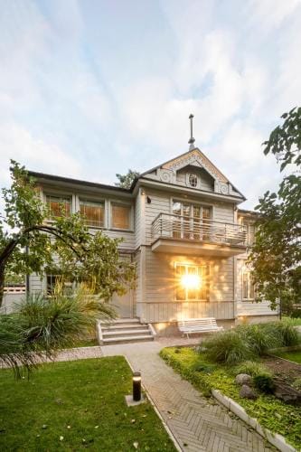 Suite with private bathroom at three bedroom interwar Villa Grabyte with daily spaces to share by pi Hotel in Lithuania