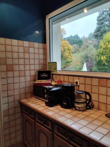 Chambre calme et cosy, ideal pour vos deplacements professionnels, ImaginaSoi Hotel in Auvergne-Rhône-Alpes