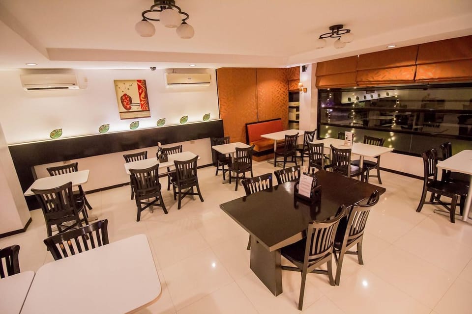 The Red Palm Suites and Restaurant Hotel in Caraga
