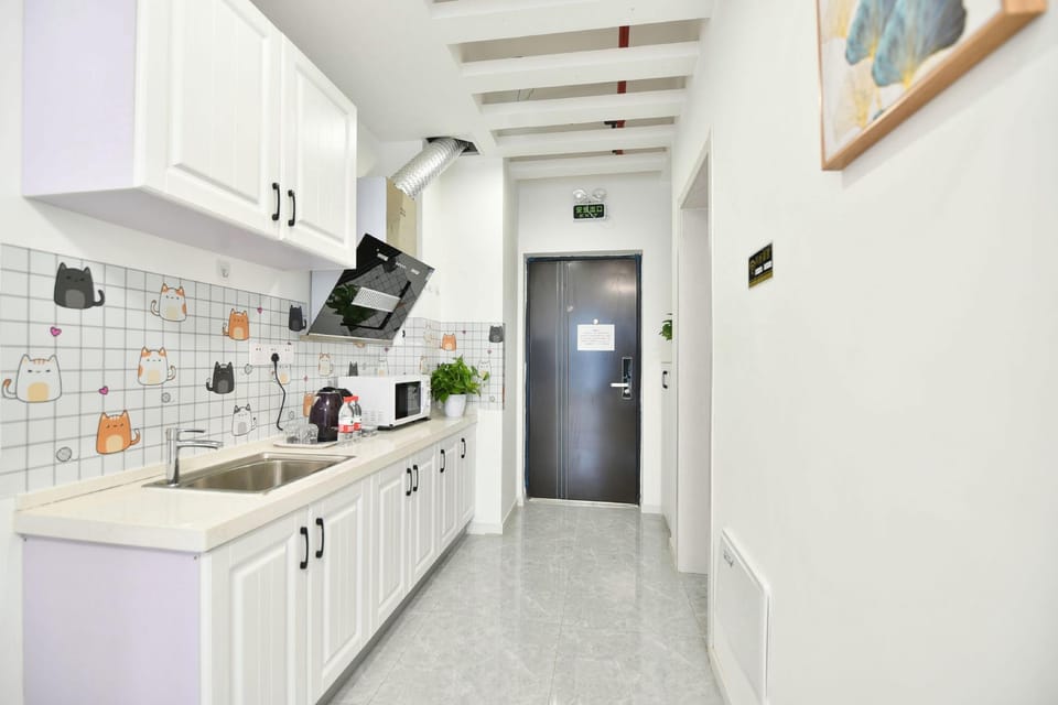 Xinyu Apartment (Nanjing Xianlin University Town Wanda Mao Branch) Hotel in Nanjing