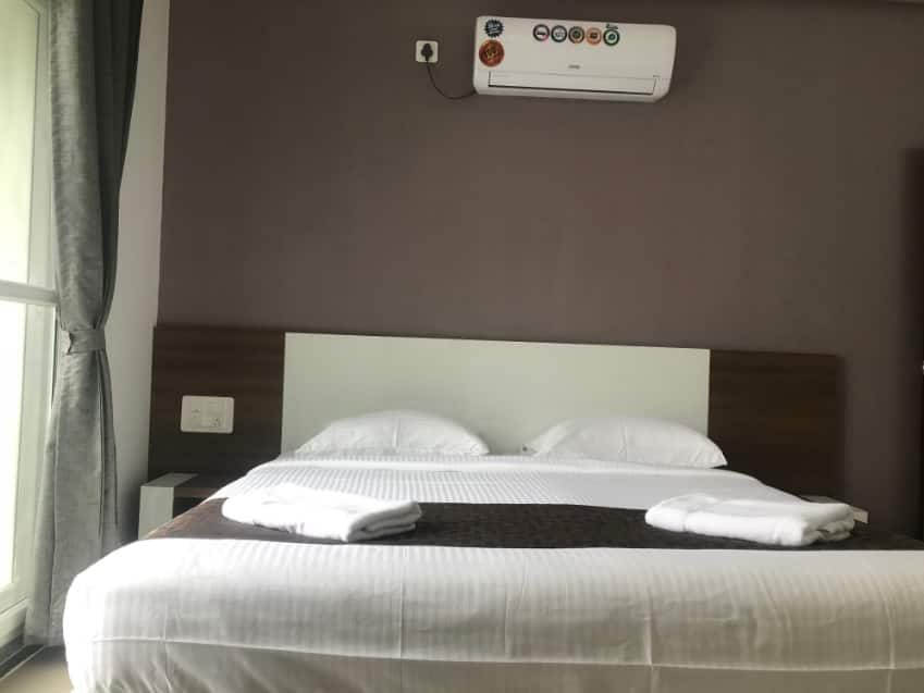 Varsha Enclave - Delta House Hotel in Mysuru