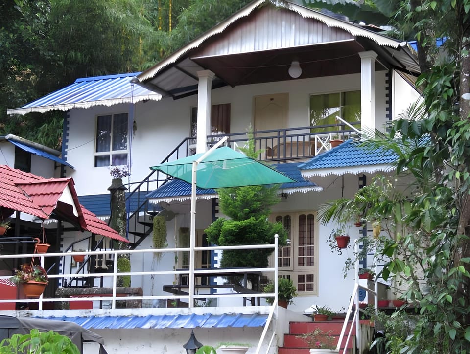Greenwoods Cottages Hotel in Kerala