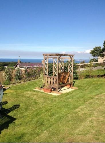 Angies Den - quirky cabin with hot tub & views Inn in Llanasa