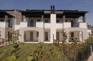 Apartment with swimming pool and garden in a tourist village Hotel in Bibione