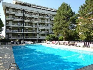 Cozy studio with swimming pool and balcony- By Beahost Rentals Hotel in Porto Santa Margherita