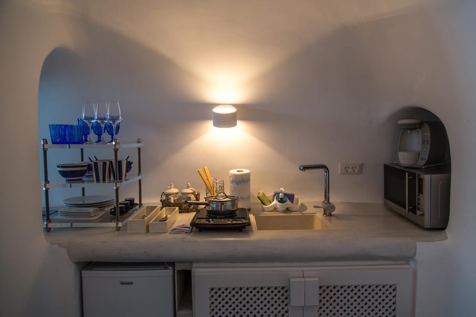 Lava Caves Hotel in Oia