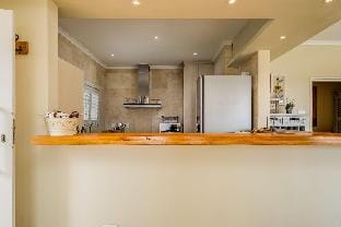 Beach-style Camps Bay Home w Pool   Garden  Barbados Hotel in Camps Bay