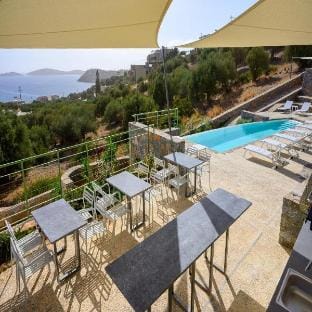 Crown Suite w Shared Pool by Roots Suites Hotel in Lasithi