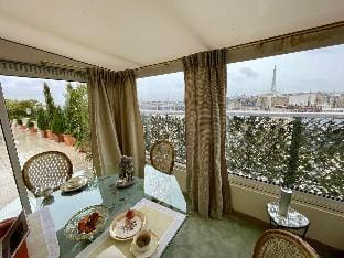 Indulgence  is a Splendid Paris Penthouse apartment with Divine Terrace Hotel in Paris