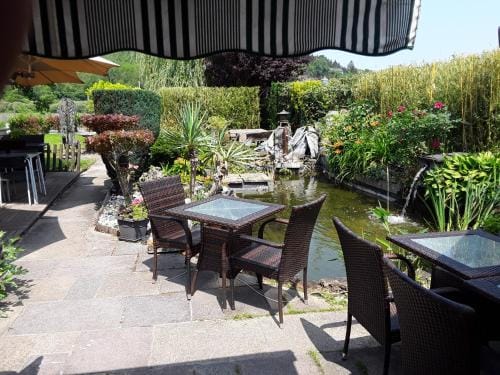 Le Jardin du The Bord de la Meuse Hotel in Wallonia, Belgium
