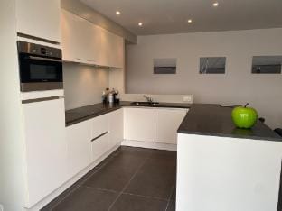 Coastal Duplex with Balcony Hotel in Koksijde