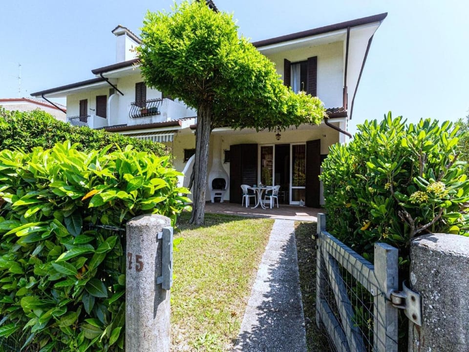Nice villa in Caorle with balcony Resort in Porto Santa Margherita