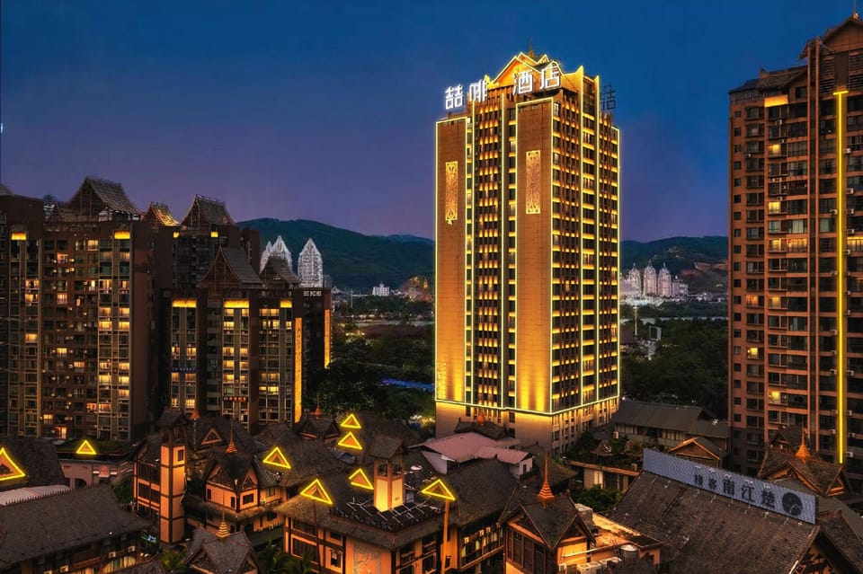 James Joyce Coffetel Xishuangbanna Poshui Square Manjinglan Ancient City Hotel in Laos