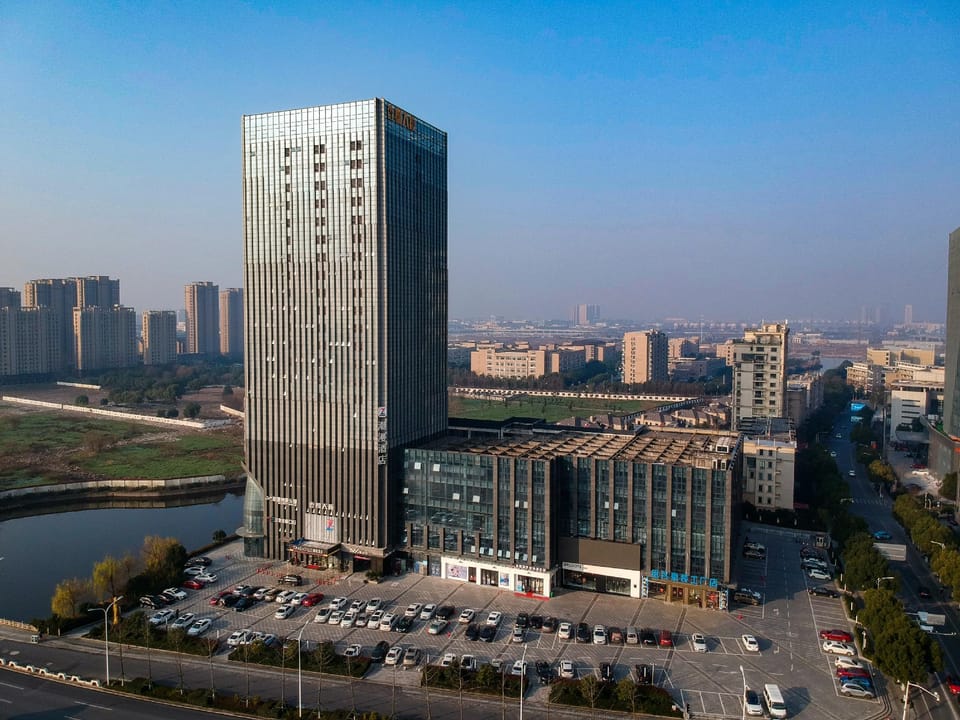 Chao Man Jiu Dian Shao Xing Jing Hu Ao Ti Zhong Xin Dian Hotel in Hangzhou