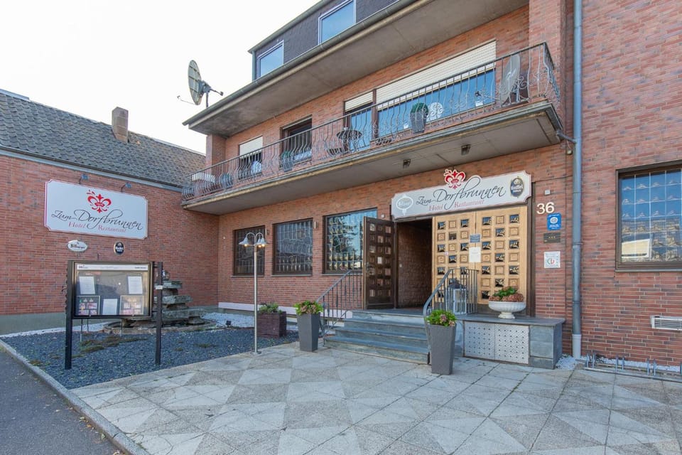 Hotel zum Dorfbrunnen - Bornheim, ihr Aufenthalt zwischen Koln & Bonn Hotel in Rhineland-Palatinate