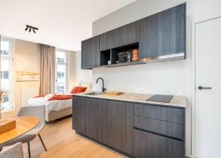 Trendy modern corner studio with a view of Ghent Hotel in Ghent