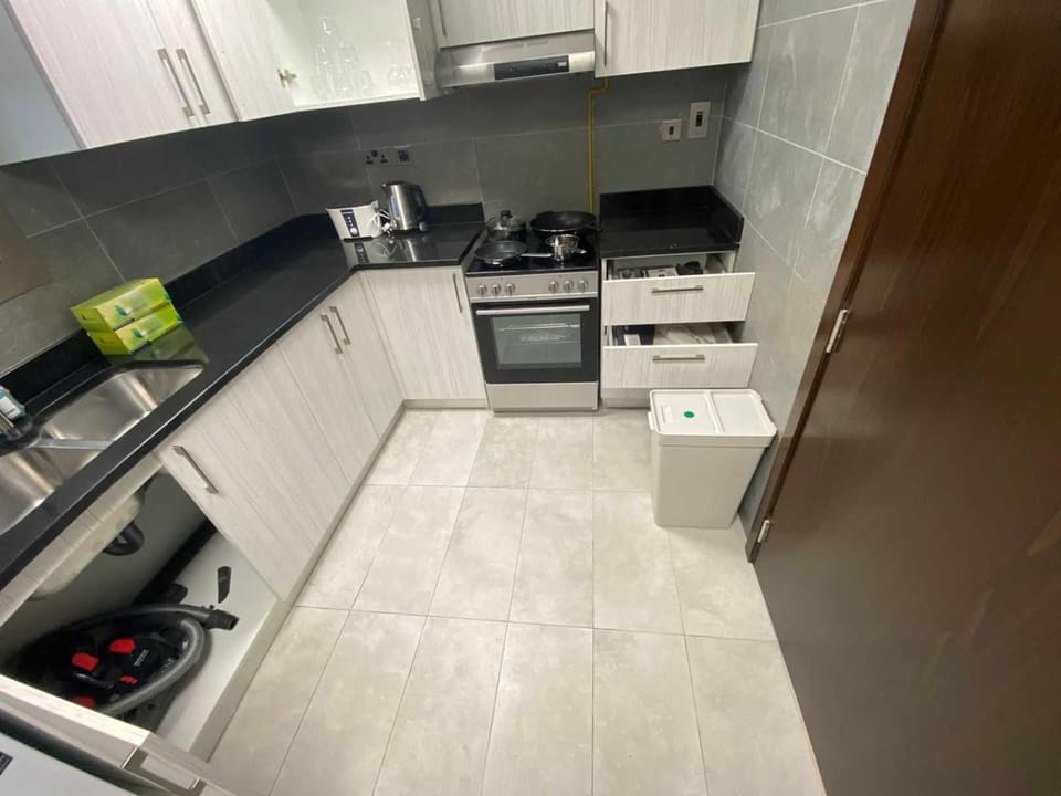 OYO HOME 1381 Premium 1 BHK With Balcony Hotel in Abu Dhabi